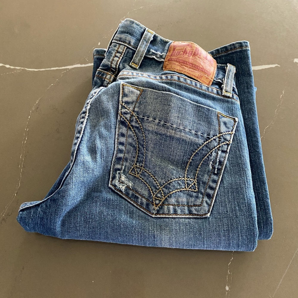 Lucky Brand Jeans Sweet Mighty Jean. Bootcut button front, mid-rise. Size 4/27.